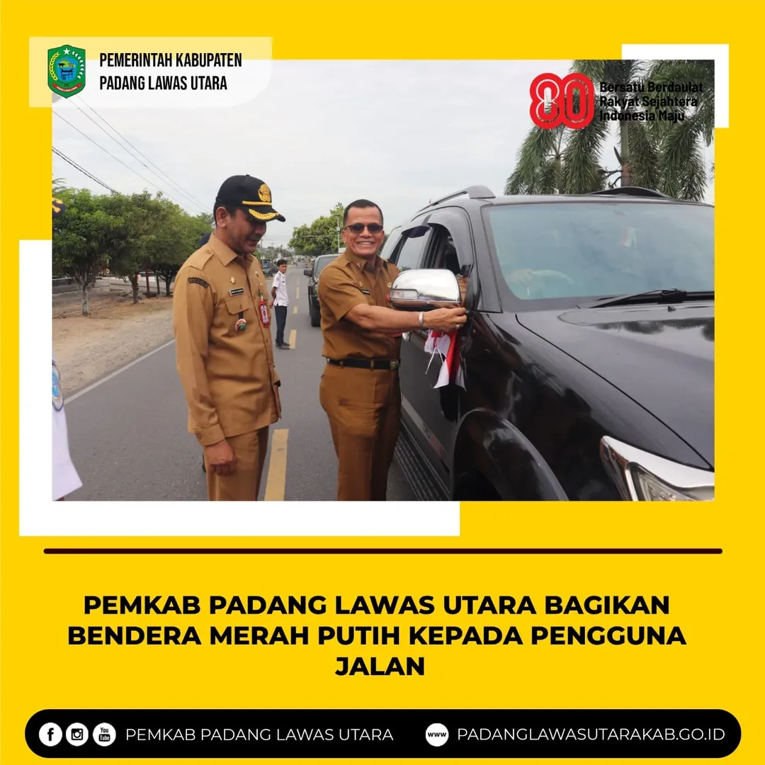 Pembagian Bendera Merah Putih Kepada Pengguna Jalan